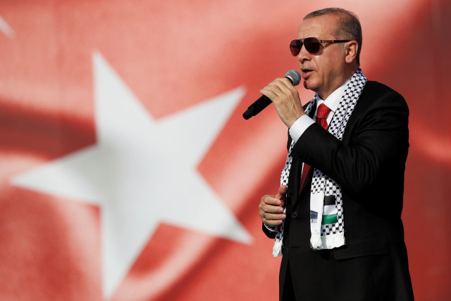  Turkish President Tayyip Erdogan delivers a speech during a protest against the recent killings of Palestinian protesters on the Gaza-Israel border and the U.S. embassy move to Jerusalem, in Istanbul, Turkey May 18, 2018.  (credit: MURAD SEZER/REUTERS)