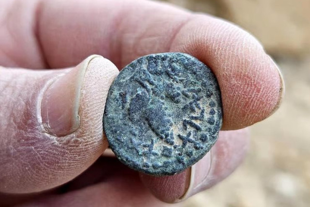  A coin dating from the Bar Kochva revolt and bearing the inscription “One year since Israel’s redemption.” (credit: Israel Antiquities Authority via sivanrahavmeir.com)