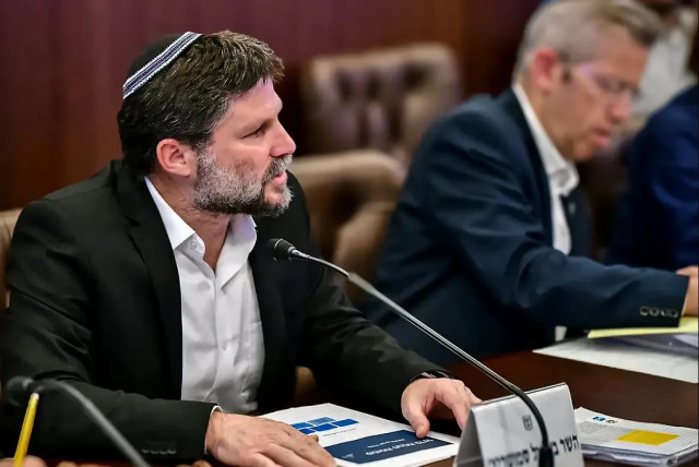 The dead are piling up - and the budgets are being cut. Finance Minister Bezalel Smotrich at a discussion in the Socio-Economic Cabinet (credit: Photo processing, spokeswoman for the Ministry of Finance)