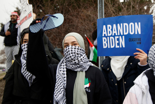  Protestors rally for a cease fire in Gaza outside a UAW union hall during a visit by U.S. President Joe Biden in Warren, Michigan, U.S. February 1, 2024. (credit: REBECCA COOK/REUTERS)
