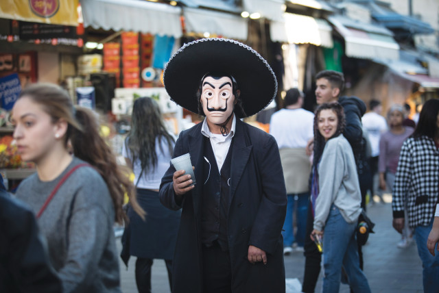  PURIM TESTIFIES: Our chosen status could outlast not just sin, but exile. (credit: HADAS PARUSH/FLASH90)