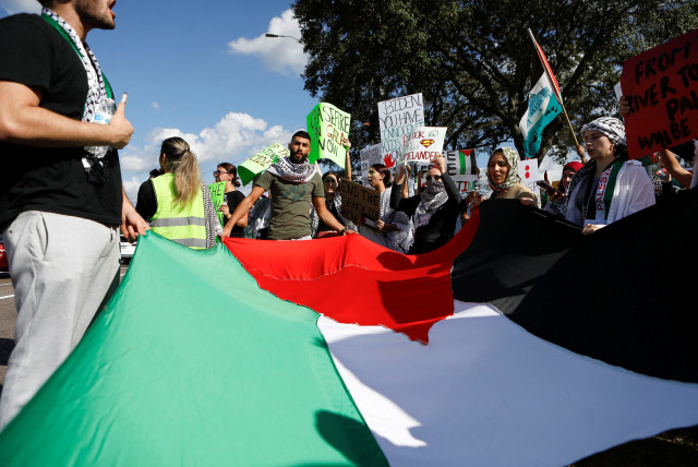  People attend a rally calling for a cease fire in Gaza, amid the ongoing conflict between Israel and Hamas, in Tampa, Florida, U.S., October 21, 2023. (credit: OCTAVIO JONES/REUTERS)
