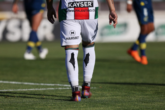  Palestino players socks are seen during the match. Palestino club was founded by Chile's Palestinian community. The club has been very active in support of the community amid the ongoing conflict between Israel and Hamas. (credit: REUTERS/IVAN ALVARADO)