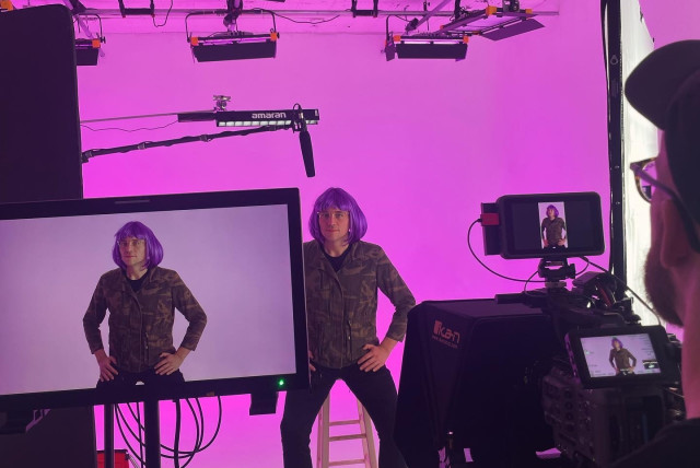 SPAULDING FILMING one of his purple-hair girl videos.  (credit: Daniel-Ryan Spaulding)