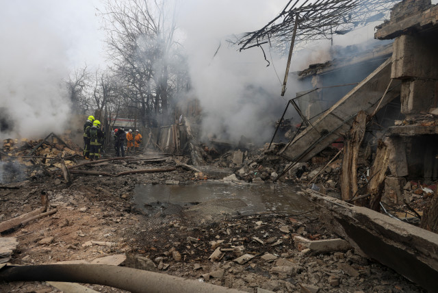  Rescuers work at a site of a residential area hit by a Russian missile strike, amid Russia's attack on Ukraine, in Odesa, Ukraine March 15, 2024. (credit: REUTERS/STRINGER)