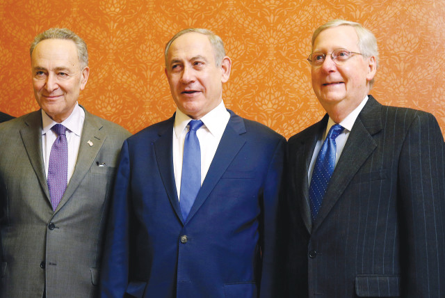  PRIME MINISTER Benjamin Netanyahu is flanked by then-Senate minority leader Chuck Schumer (left) and then-Senate majority leader Mitch McConnell, at the US Capitol in 2017. (credit: JOSHUA ROBERTS/REUTERS)