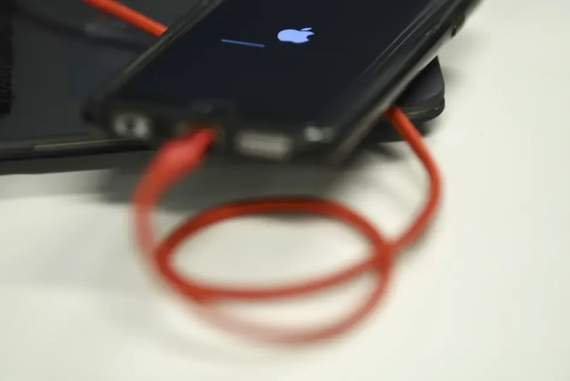  An iPhone being charged (credit: GETTY IMAGES)