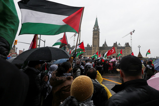  Protesters hold an effigy of Canada’s Prime Minister Justin Trudeau during a rally to call for a ceasefire, amid the ongoing conflict between Israel and the Palestinian Islamist group Hamas in Gaza, on Parliament Hill in Ottawa, Ontario, Canada March 9, 2024.  (credit: REUTERS/Ismail Shakil)