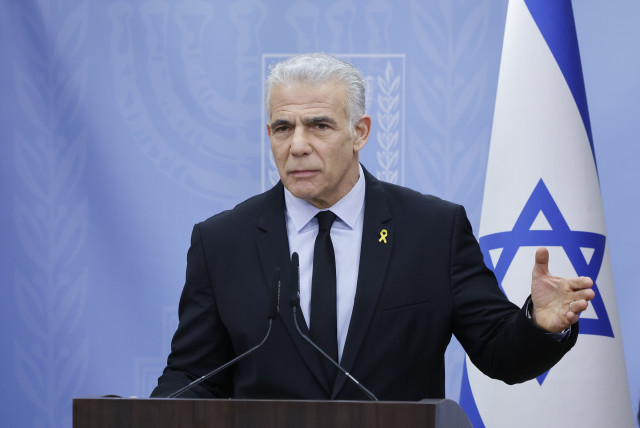  Opposition leader Yair Lapid speaks at the Knesset. March 18, 2024. (credit: MARC ISRAEL SELLEM)