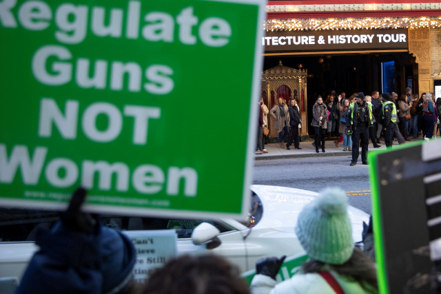  People leave the Fox Theater as abortion rights demonstrators rally across the street during the annual Women's March in Atlanta, Georgia, U.S., January 20, 2024. (credit: REUTERS/ALYSSA POINTER)