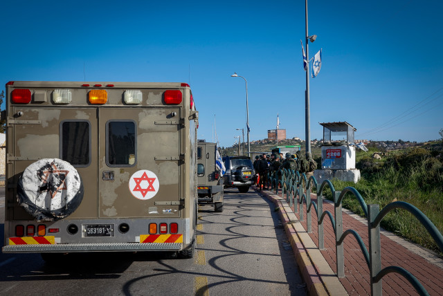  Israeli security forces at the scene of a suspected terror attack near Elazar, in Gush Etzion, in the West Bank, on March 21, 2024.  (credit: GERSHON ELINSON/FLASH90)