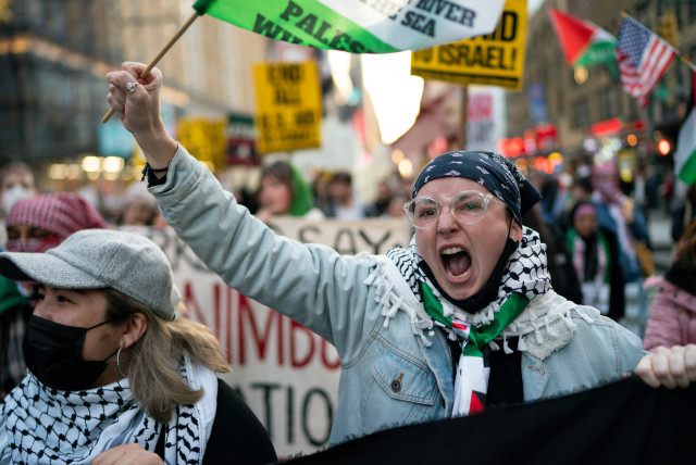  PRO-PALESTINIAN demonstrators shout slogans as they march in the ‘Shut It Down for Palestine’ protests in New York City, last December.  (credit: Eduardo Munoz/Reuters)