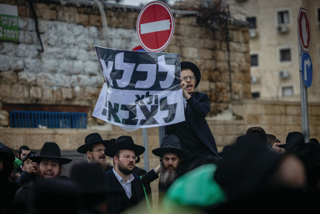  ULTRA-ORTHODOX men protest against the haredi draft, in Jerusalem last week. (credit: YONATAN SINDEL/FLASH90)
