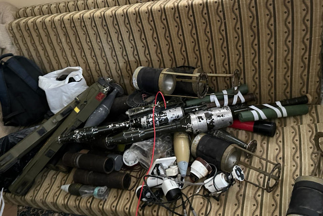  IDF finds weapons in residence in the Gaza Strip. March 23, 2024. (credit: IDF SPOKESPERSON'S UNIT)