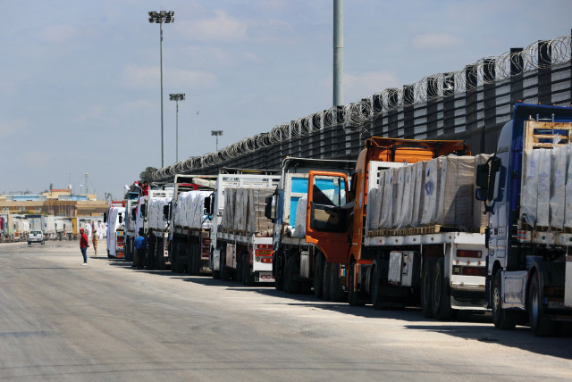  TRUCKS LINE UP near the Rafah border crossing on Saturday. It cannot be denied that the absence of an effective administrative mechanism to manage the distribution of humanitarian aid is strongly felt, says the writer. (credit: MOHAMED ABD EL GHANY/REUTERS)