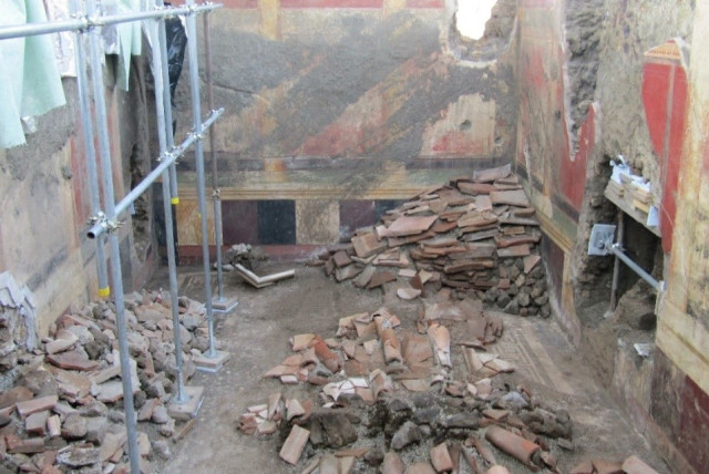 A view of the room of an ancient domus during archaeological excavations in the ancient archeological site of Pompeii, Italy, in this handout photo obtained by Reuters on March 25, 2024.  (credit: Parco archeologico di Pompei/Handout via REUTERS)