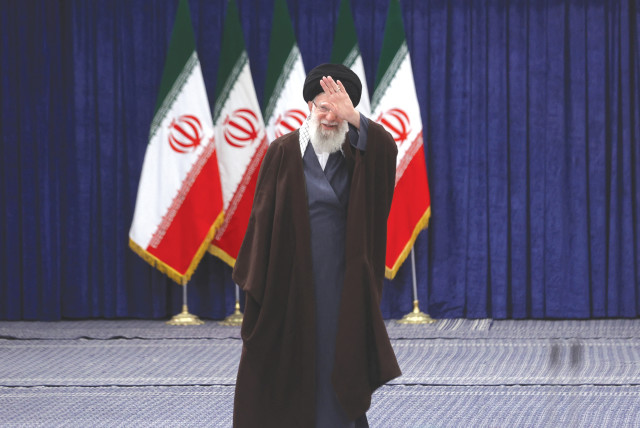  IRAN’S SUPREME Leader Ayatollah Ali Khamenei gestures after he votes during parliamentary elections in Tehran, earlier this month. Iran, like all dictatorial regimes, will one day fall and we in the free world have a duty to accelerate this process, says the writer. (credit: WEST ASIA NEWS AGENCY/REUTERS)