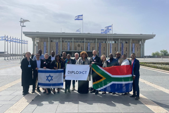  South African Friends of Israel, DiploAct delegation in front of the Knesset building in Jerusalem. (credit: DIPLOACT)