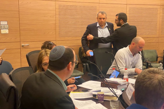  Mk Gilad Kariv being ejected from the Knesset Constitutional Committee meeting after causing a commotion, March 27, 2024. (credit: DANI SHEM TOV/KNESSET SPOKESPERSONS OFFICE)