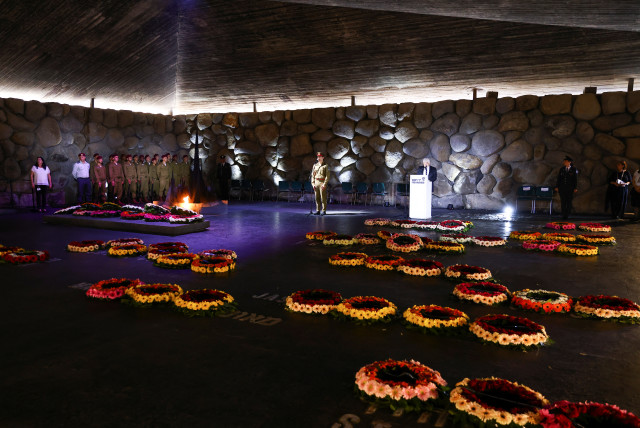  A general view during a wreath-laying ceremony marking Holocaust Remembrance Day in the Hall of Remembrance at Yad Vashem, the World Holocaust Remembrance Centre, in Jerusalem, April 18, 2023. (credit: RONEN ZVULUN/REUTERS)