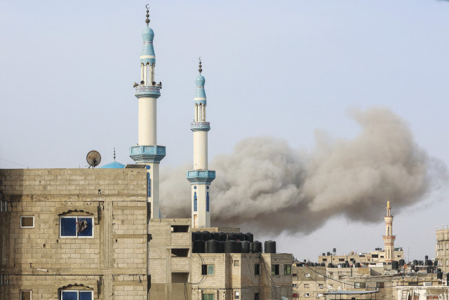  SMOKE RISES following an Israeli strike in Rafah, in the southern Gaza Strip, last week. Prime Minister Benjamin Netanyahu has said there is no way to defeat Hamas without entering Rafah, the writer notes. (credit: Ahmed Zakot/Reuters)