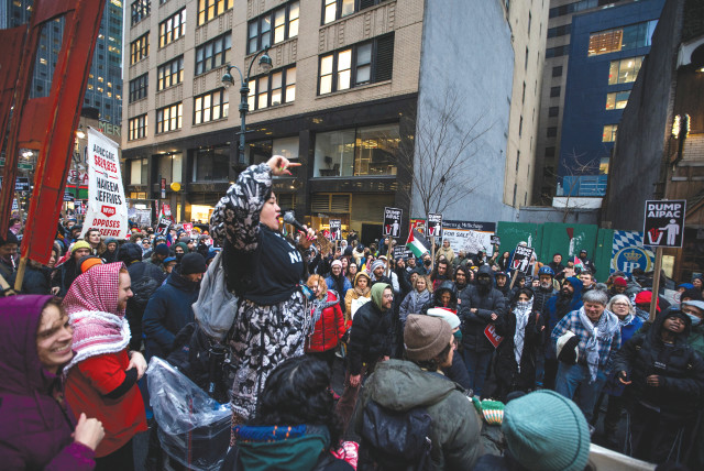  Protesters hold a rally across from AIPAC offices in New York City, in February, after marching and demanding a ceasefire in Gaza. (credit: EDUARDO MUNOZ / REUTERS)