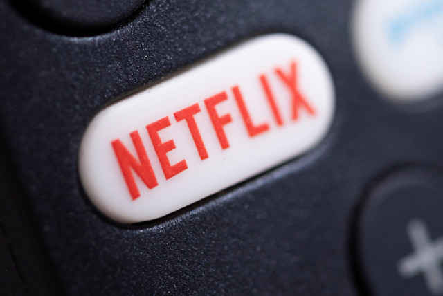  The Netflix logo is seen on a TV remote controller, in this illustration taken January 20, 2022. (credit: DADO RUVIC/REUTERS)
