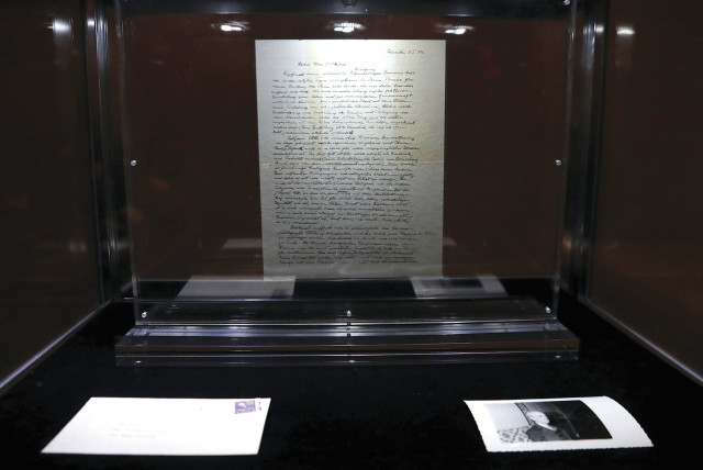  A letter known as ‘The God Letter’ written by Albert Einstein and addressed to philosopher Eric Gutkind in 1954 is seen on display at Christie’s auction house ahead of its sale in New York City.  (credit: SHANNON STAPLETON/ REUTERS)