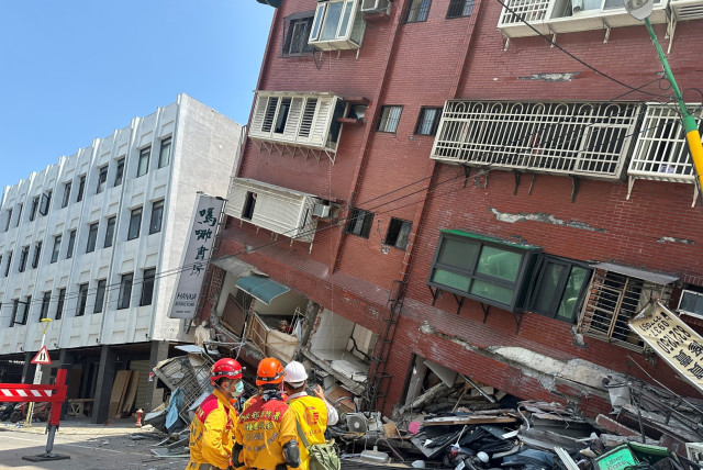  Firefighters work at the site where a building collapsed following the earthquake, in Hualien, Taiwan, on April 3, 2024 (credit: TAIWAN NATIONAL FIRE AGENCY/HANDOUT VIA REUTERS)