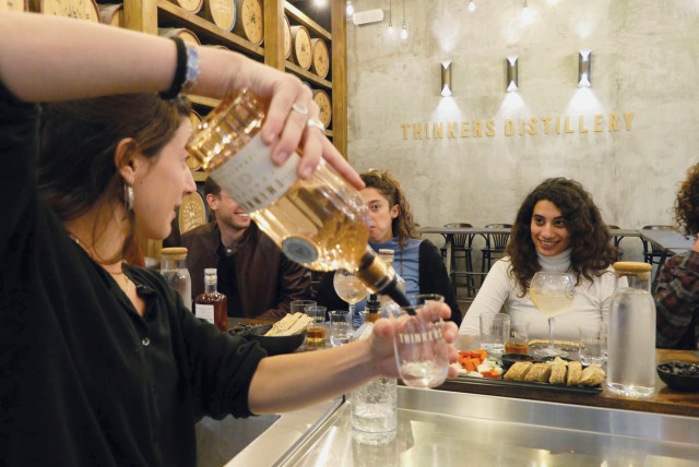  THINKERS DISTILLERY IS a fun place to meet, talk, taste, and snack with friends. (credit: Thinkers Distillery)