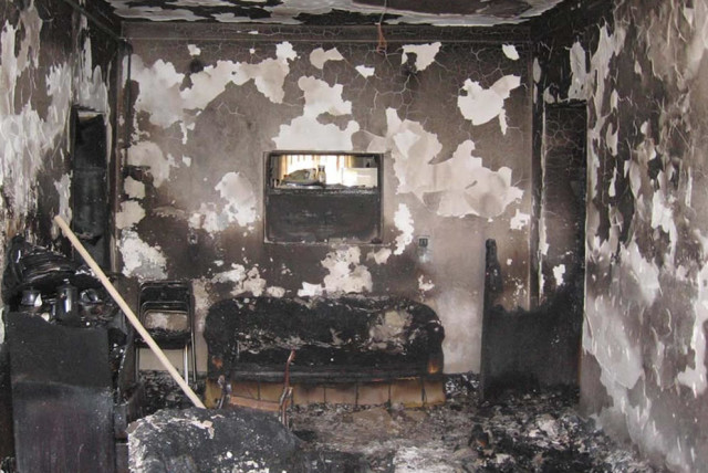  Baha'i homes have been the target of arsonists, including this one in Kerman, according to the Baha’i International Community. (credit: Reprinted with permission of the Baha’í International Community)