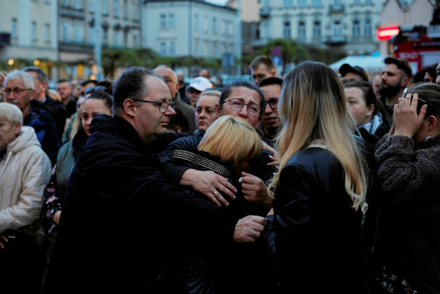  Mourners gather to hold a vigil for the Polish aid worker Damian Sobol who was killed by the Israeli army in Gaza, among seven people working for the charity World Central Kitchen (WCK) who were killed in an Israeli airstrike, in Przemysl, Poland, April 4, 2024. (credit: Patryk Ogorzalek/ Agencja Wyborcza.pl via REUTERS)