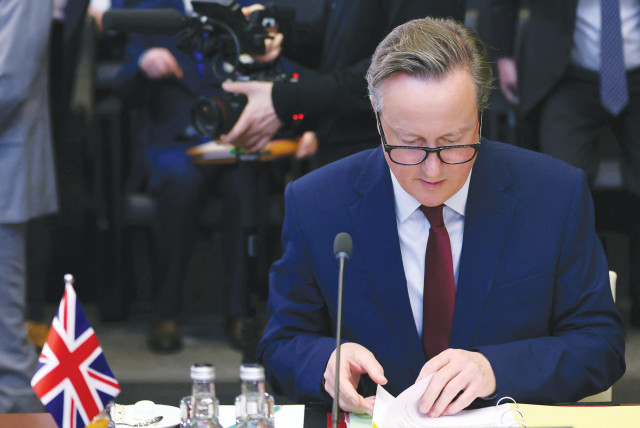  BRITISH FOREIGN SECRETARY David Cameron takes part in a NATO meeting in Brussels, last week. ‘The Iranian regime and the criminal gangs who operate on its behalf pose an unacceptable threat to the UK’s security,’ he says. (credit: JOHANNA GERON/REUTERS)