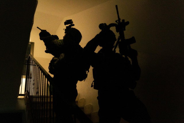  IDF troops operate in the West Bank during an overnight operation. April 8, 2024. (credit: IDF SPOKESPERSON'S UNIT)