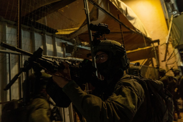   IDF troops operate in the West Bank during an overnight operation. April 8, 2024. (credit: IDF SPOKESPERSON'S UNIT)