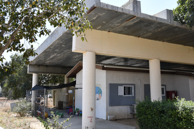  A concrete slab protects a community area on Kibbutz Sufa. (credit: SETH J. FRANTZMAN)