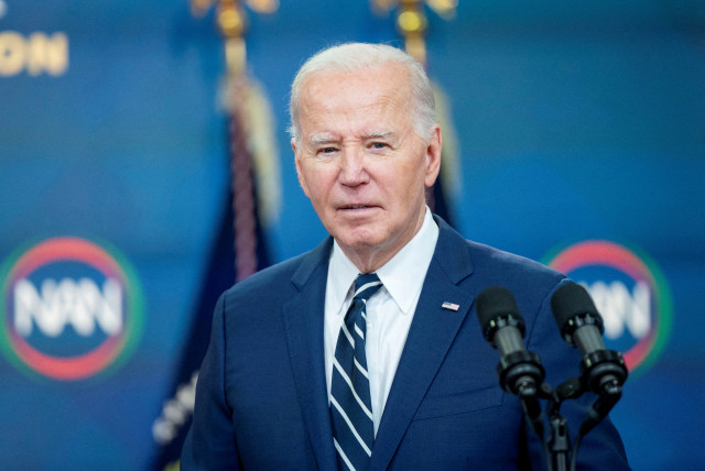  U.S. President Joe Biden delivers virtual remarks during the National Action Network Convention from the Eisenhower Executive Office Building's South Court Auditorium at the White House in Washington, U.S., April 12, 2024. (credit: REUTERS/BONNIE CASH)