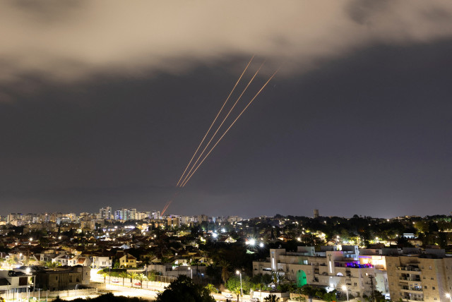  An anti-missile system operates after Iran launched drones and missiles towards Israel, as seen from Ashkelon, Israel April 14, 2024. (credit: REUTERS/AMIR COHEN)