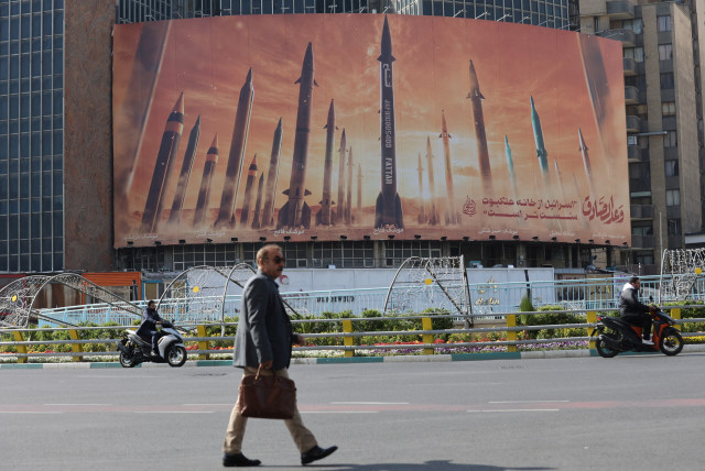  An anti-Israel billboard with a picture of Iranian missiles is seen in a street in Tehran, Iran April 15, 2024.  (credit: MAJID ASGARIPOUR/WANA (WEST ASIA NEWS AGENCY) VIA REUTERS)