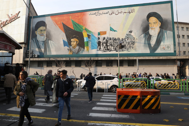  A mural depicting the late leader of the Islamic Revolution Ayatollah Ruhollah Khomeini and Iran's Supreme Leader Ayatollah Ali Khamenei are seen on a building in a street in Tehran, Iran March 3, 2024.  (credit: Majid Asgaripour/WANA/via Reuters)