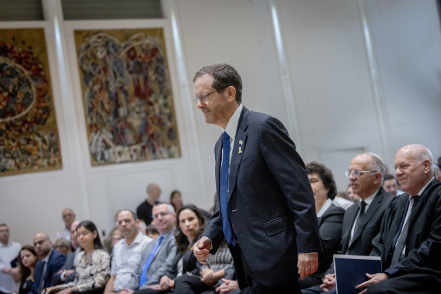  Israeli president Isaac Herzog speaks at a swearing in ceremony for newly appointed judges at the President's residence in Jerusalem, on April 18, 2024. (credit: Chaim Goldberg/Flash90)