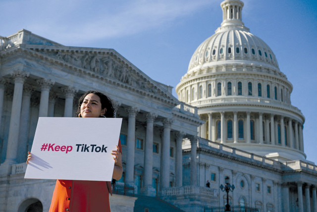  Giovanna Gonzalez of Chicago demonstrates on Capitol Hill following a press conference by TikTok creators to voice their opposition to the Protecting Americans from Foreign Adversary Controlled Applications Act on March 12.  (credit: Craig Hudson/Reuters)