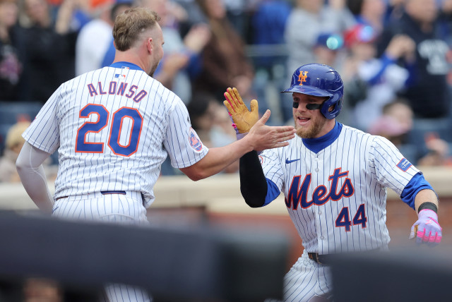  Apr 17, 2024; New York City, New York, USA; New York Mets center fielder Harrison Bader (44) celebrates his two run home run against the Pittsburgh Pirates with first baseman Pete Alonso (20) during the sixth inning at Citi Field. (credit: Brad Penner-USA)