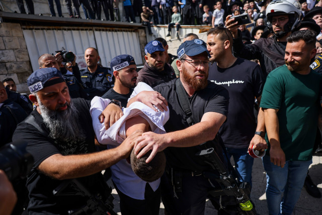  Police arresting the two terrorists who carried out a ramming terror attack in Jerusalem, a few hours before the jewish holiday of Passover, April 22, 2024 (credit: Chaim Goldberg/Flash90)