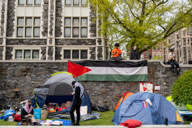  Students and pro-Palestinian supporters occupy a plaza at the City College of New York campus, during the ongoing conflict between Israel and the Palestinian Islamist group Hamas, in New York City, U.S., April 27, 2024 (credit: REUTERS/David Dee Delgado)