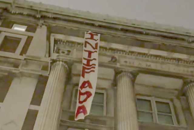  An ''Intifada'' banner waves over Columbia University after students seize Hamilton Hall on 116th Street in New York City, April 30, 2024. (credit: JESSICA SCHWALB)