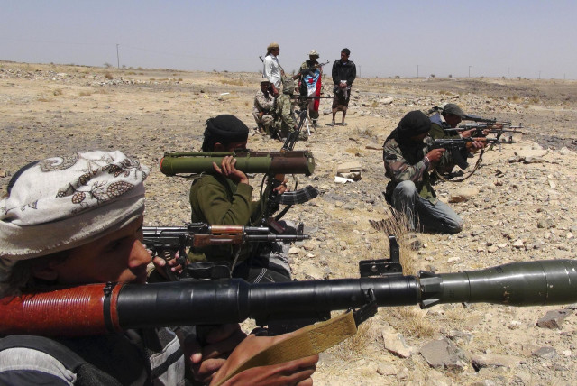  Southern movement successionists take up positions in the Jabal al-Ierr area of Yemen's southern Lahej province, as they prepare to secure the area against Shi'ite Houthis, March 7, 2015. (credit:  REUTERS/Stringer)