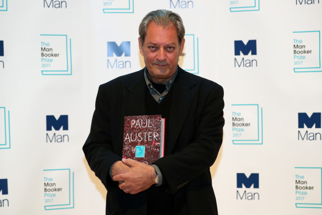 Author Paul Auster poses for photographs during a photo-call in London for the six Man Booker shortlisted fiction authors, on the eve of the prize giving in London, Britain October 16, 2017. (credit: Hannah McKay/Reuters)