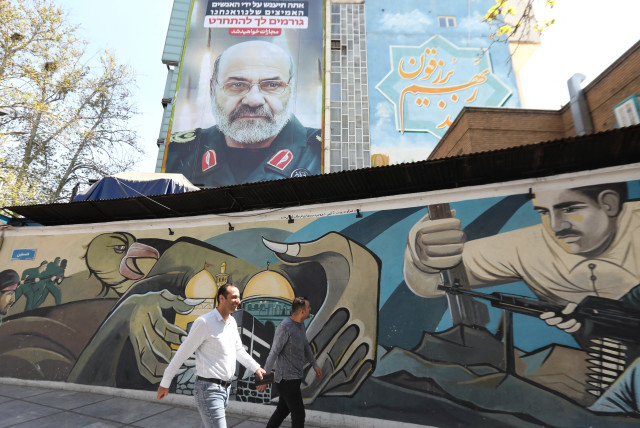  BILLBOARD OF slain Iranian Brig.-Gen. Mohammad Reza Zahedi includes slogan in Hebrew ‘Making you regret it,’ seen April 3 in Tehran’s Palestine Square.  (credit: Atta Kenare/AFP via Getty Images)