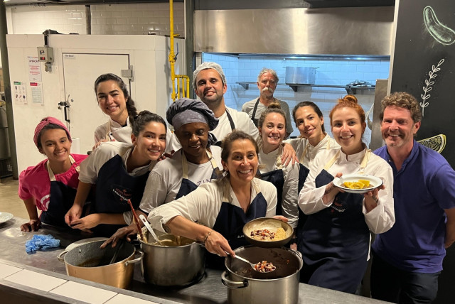  Gastromotiva, the unique cooking school opened by chef David Hertz, far right, offers professional training to underprivileged Brazilians so they can make a living in the food business and launch their own businesses. (credit: Courtesy of David Hertz)